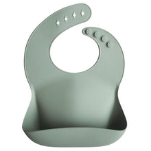 Load image into Gallery viewer, Mushie Silicone Feeding Bib
