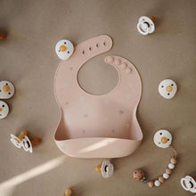 Load image into Gallery viewer, Mushie Silicone Feeding Bib