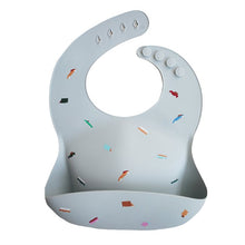 Load image into Gallery viewer, Mushie Silicone Feeding Bib