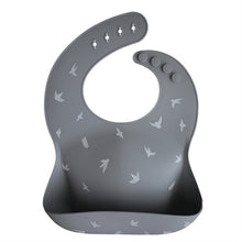 Load image into Gallery viewer, Mushie Silicone Feeding Bib