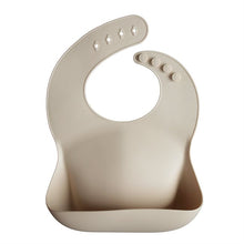 Load image into Gallery viewer, Mushie Silicone Feeding Bib