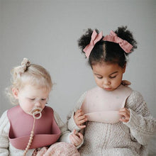 Load image into Gallery viewer, Mushie Silicone Feeding Bib