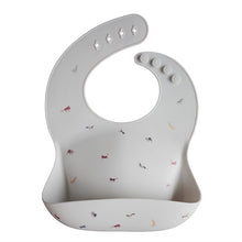 Load image into Gallery viewer, Mushie Silicone Feeding Bib
